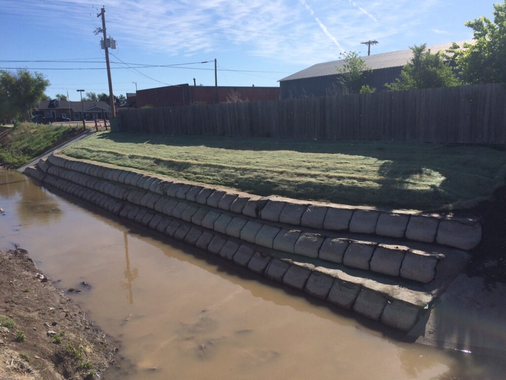 Seawall made out of TrapBag erosion control barriers