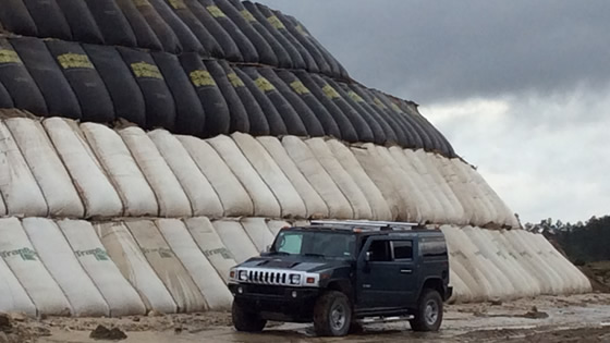 Hummer in front of a Cellular MSE Retaining Wall