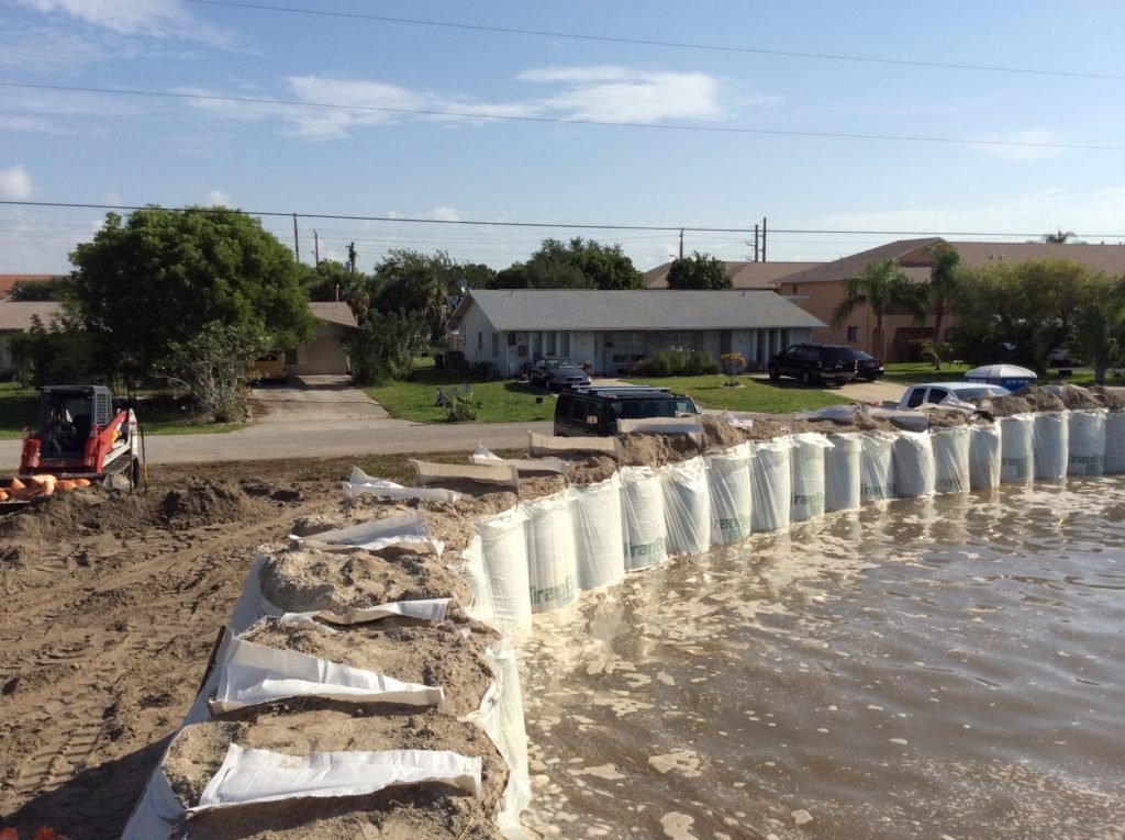 TrapBag flood barrier in residential neighborhood