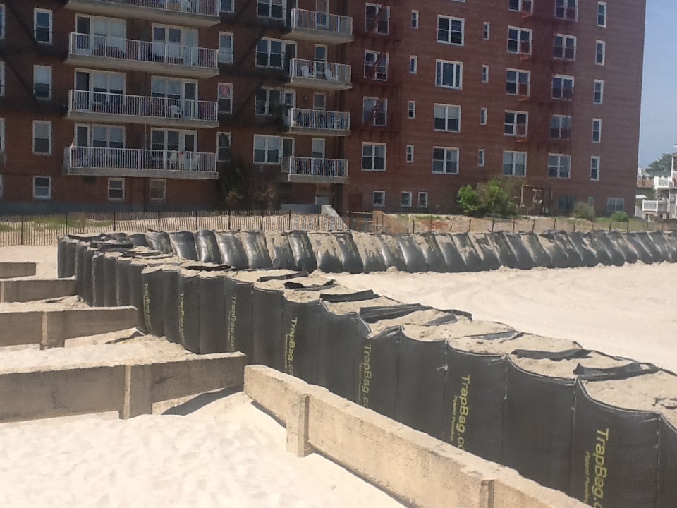 TrapBags used as barrier on beach to protect residential building