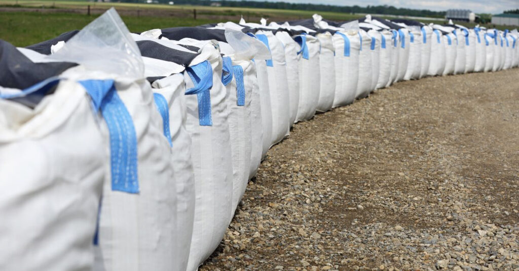 A line of upright sandbags